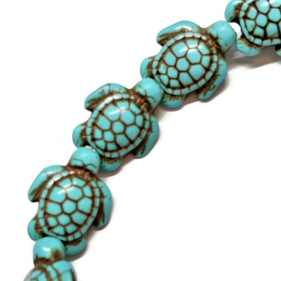 As Low As $2 Turquoise Synthetic Turquoise Turtle Beads 22mm x 13mm (8) - Picture 1 of 2